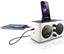 Picture shows the  side view of a Philips alarm clock radio with iPhone/iPod dock.  It is connected to an iPad with Usb charging .