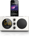 Picture shows a front view of a philips alarm clock radio with ipod dock